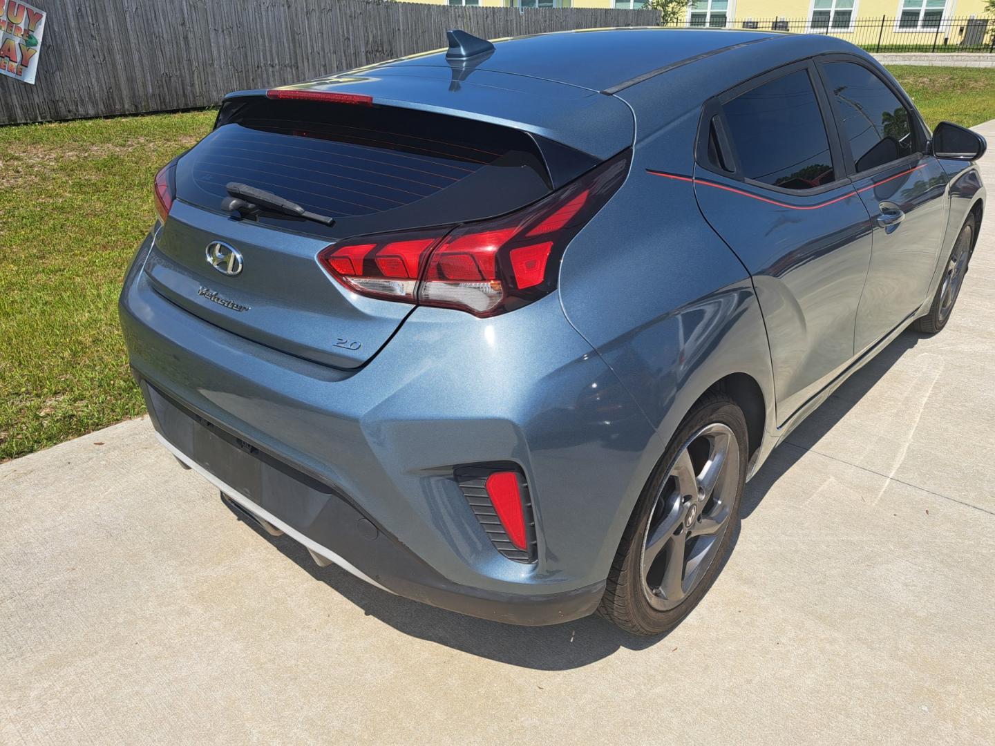 2019 Grey Hyundai Veloster 2.0 6A (KMHTG6AFXKU) with an 2.0L L4 DOHC 16V engine, 6A transmission, located at 1181 Aurora Rd, Melbourne, FL, 32935, (321) 241-1100, 28.132914, -80.639175 - Photo#1